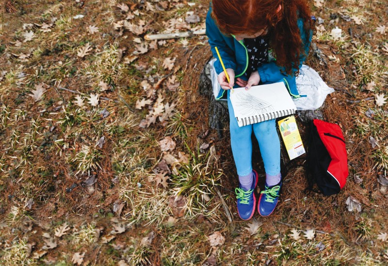 Lacey sketches in her nature journal. Photo by Cheryl Senter.