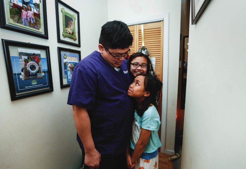 Gerie Pingol at home with daughters Catherine and Christine. Photo by Cheryl Senter.