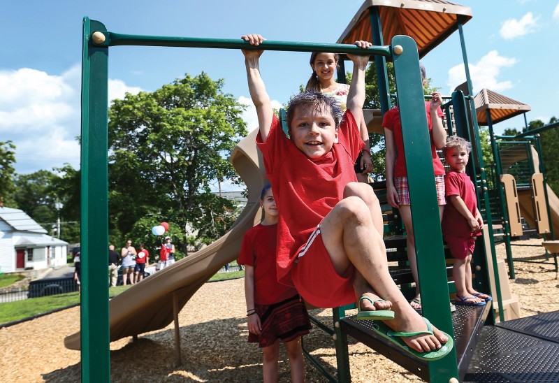 Kids being kids on their new playground in Pittsfield, NH. Photo by Cheryl Senter.