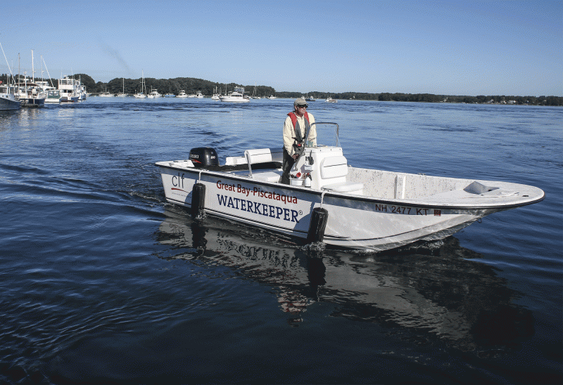 Jeff Barnum, the Great Bay Waterkeeper, maneuvers a shallow-draft bay boat at Great Bay Marine in Newington. (Photo by Cheryl Senter).