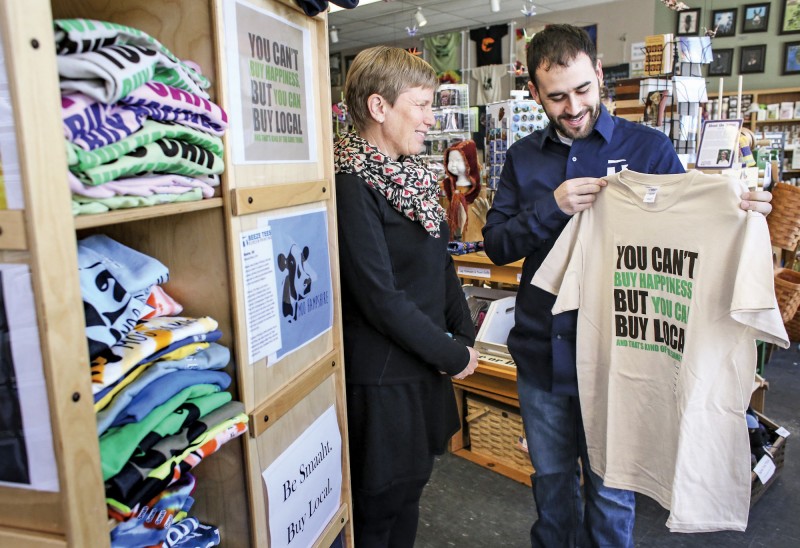 Mary Ann Kristiansen and Tim Pipp at the Hannah Grimes Marketplace on Main Street in Keene. Photo by Cheryl Senter.