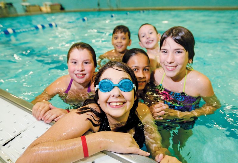 Children in a swimming pool. New Hampshire Tomorrow: Investing in our Kids The Foundation is committed to increasing opportunity for all of New Hampshire’s kids