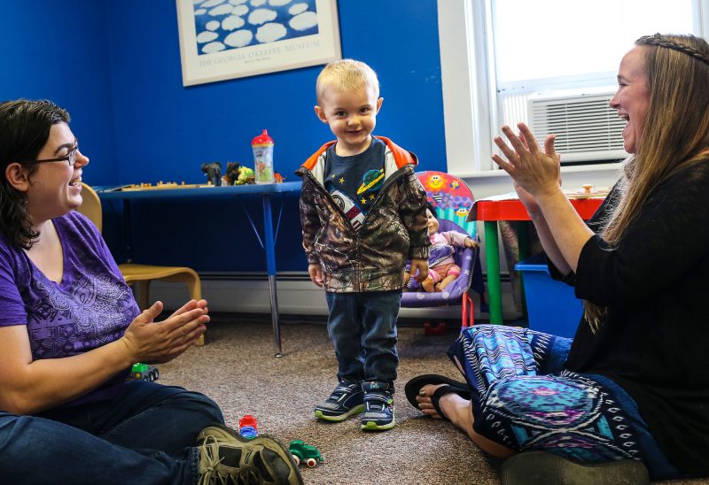 TLC Family Resource Center’s Melony Williams (right) visits with Krystle and her son Jaxon. (Photo by Cheryl Senter).