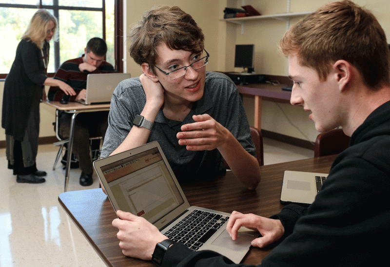 Students are learning computer programming and earning college credits thanks to a new career pathways program at Portsmouth High School. (Photo by Cheryl Senter).