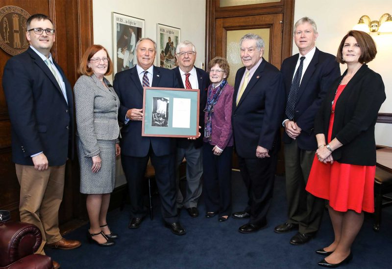 Left to right: John Beardmore, commissioner, New Hampshire Department of Revenue; New Hampshire State Rep. Mary Beth Walz; Terry Pfaff, chief of staff, New Hampshire House of Representatives; Sylvio Dupuis; Tricia Lucas; New Hampshire State Sen. Lou D’Allesandro; Philip Bryce, director of the Division of Parks and Recreation in the New Hampshire Department of Resources and Economic Development; Catherine Provencher, vice chancellor for financial affairs and treasurer, University System of New Hampshire. (Photo by Cheryl Senter.)