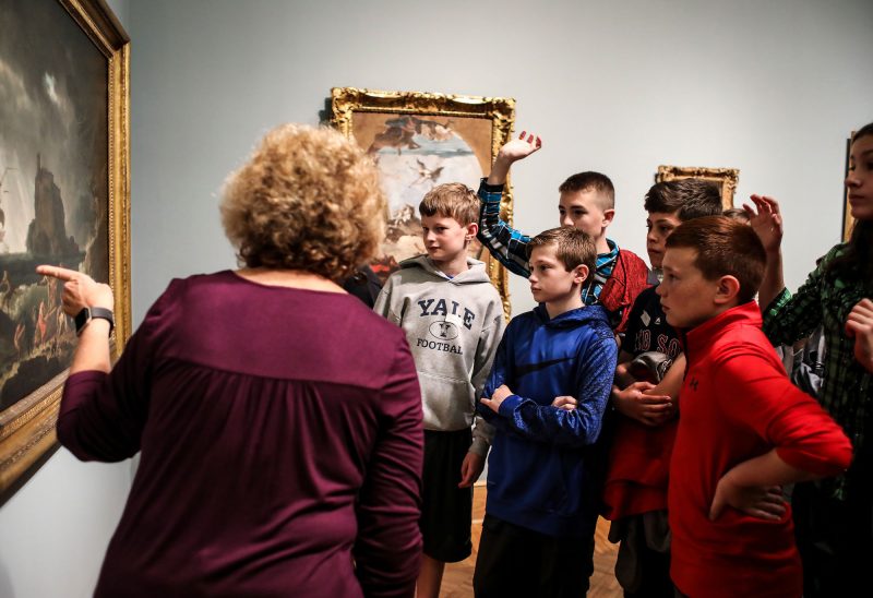 A docent from the Currier Museum of Art asks a group of sixth-graders from Brookline what might be happening in “The Storm” by Claude-Joseph Vernet. (Photo by Cheryl Senter.)