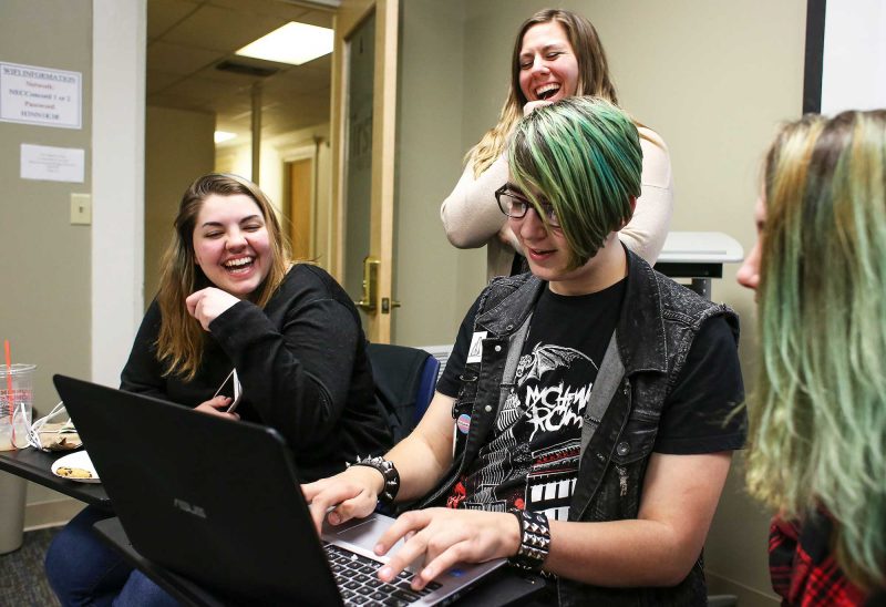 High school students with Lauren Petratis, teacher and GLSEN NH youth outreach chair. (Photo by Cheryl Senter.)