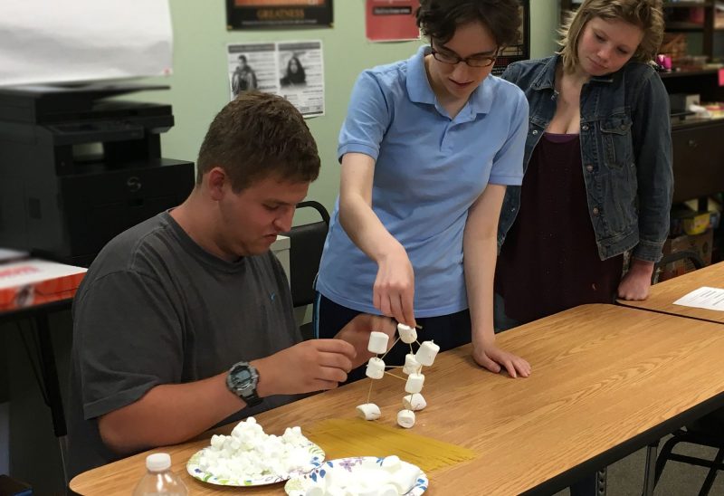 IMPACCT Academy students begin their 14-weeks by working with colleagues on a team-building activity that also fosters many of the soft skills employers want to see. (Photo courtesy of Granite State Independent Living.)