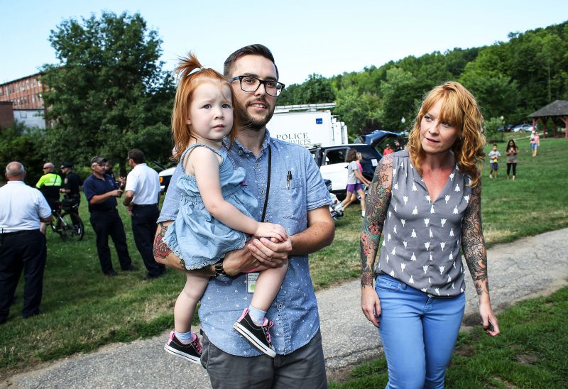 Dean Lemire, who is in long-term recovery, enjoys time with his family in Dover, N.H., during a recent National Night Out, an annual nationwide event that promotes strong neighborhood ties and improved community-police relations. (Photo by Cheryl Senter.)