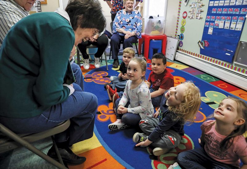 Kathy St. Louis reads to preschoolers at the Penacook Community Center. (Photo by Cheryl Senter.)