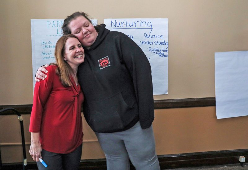 Amanda Littlefield of Belmont (right) with Kerri Lowe of the Lakes Region Family Resource Center. (Photo by Cheryl Senter.)