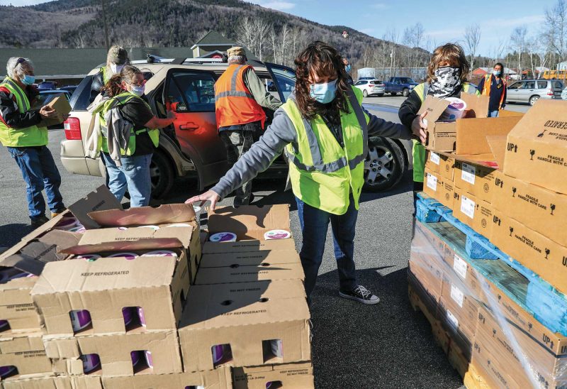 The New Hampshire Food Bank distributes food to families in Colebrook. (Photo by Cheryl Senter.)