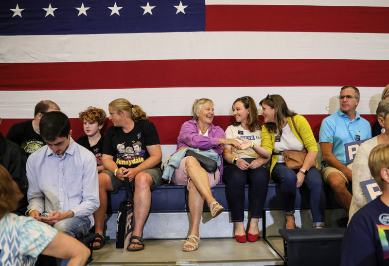 Supporters and curious voters wait to hear then Democratic presidential candidate South Bend Indiana Mayor Pete Buttigieg speak at a campaign event in Nashua NH, Aug. 23, 2019. (Photo by Cheryl Senter.)