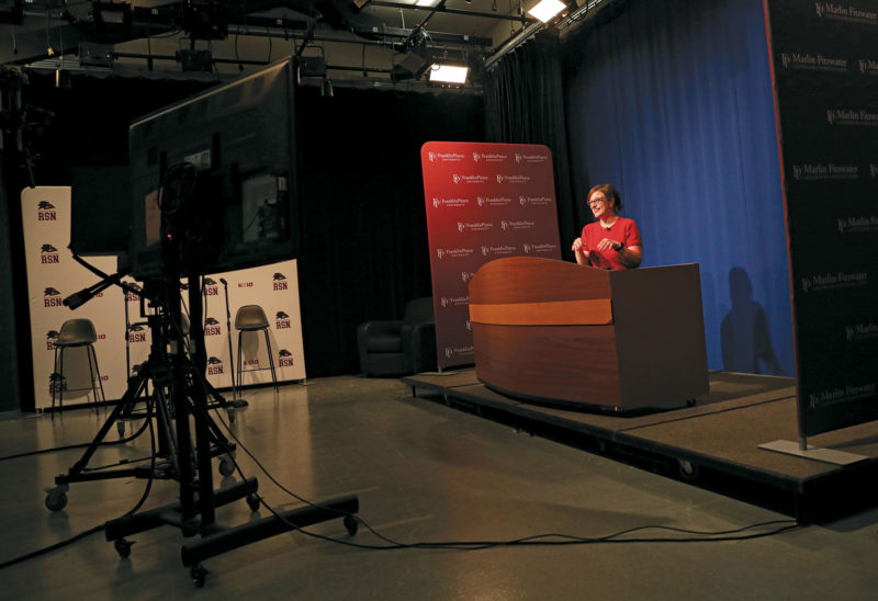 Melanie Plenda, executive director of the Granite State News Collaborative, getting ready to tape "The State We’re In," a new digital series by New Hampshire PBS produced in partnership with the Collaborative. (Photo by Cheryl Senter.)