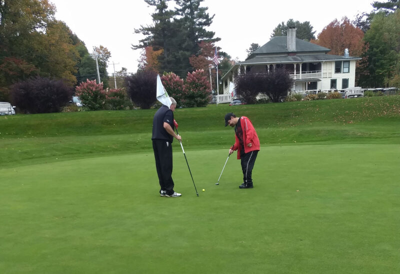 Trevor Birard of Jefferson whacks a golf ball, in thanks to the activities provided through Adaptive Sports Partners of the North Country (ASPNC). (Courtesy photo.)