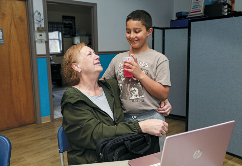 Julie and grandson Darius during a recent “Parenting the Second Time Around” program at the Upper Room family resource center. (Photo by Cheryl Senter.)