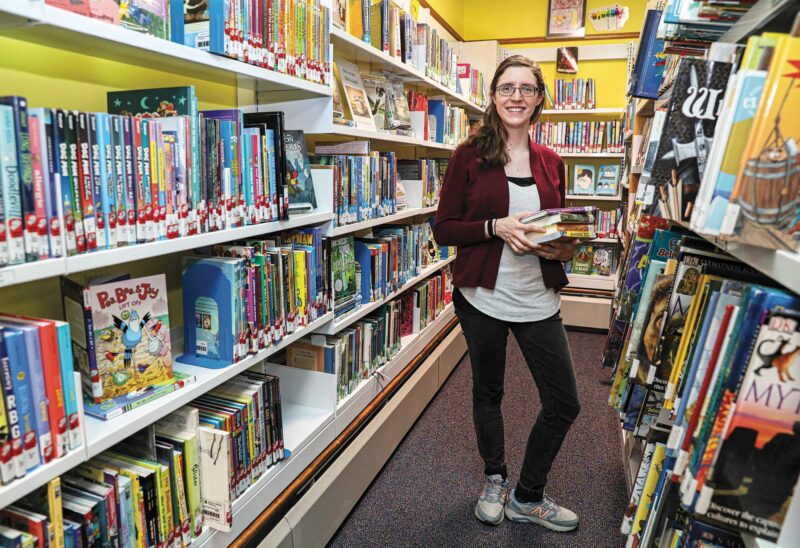 Librarian Kayla Morin-Riordan at the Goodwin Library in Farmington. (Photo by Cheryl Senter.)