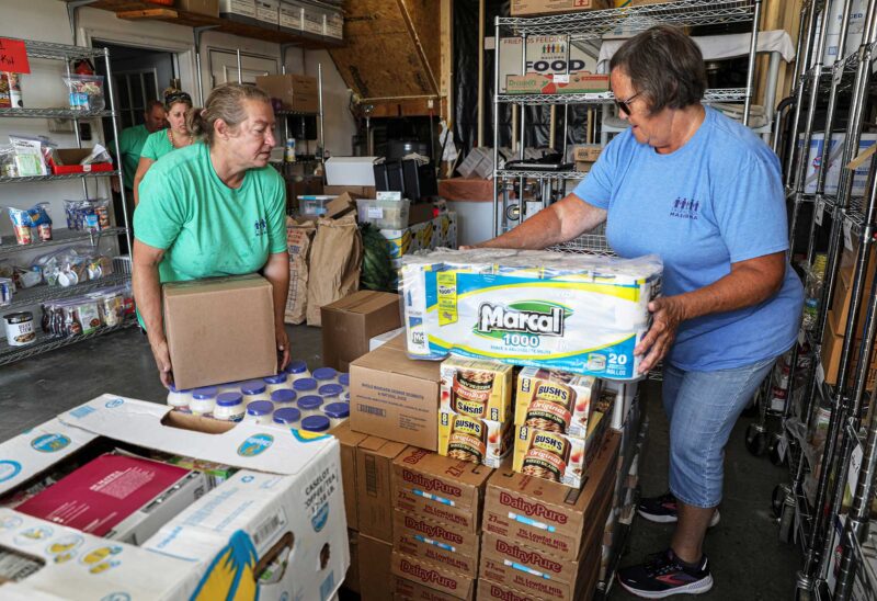 Friends of Mascoma volunteers helping at the Canaan Food Pantry. (Photo by Cheryl Senter.)