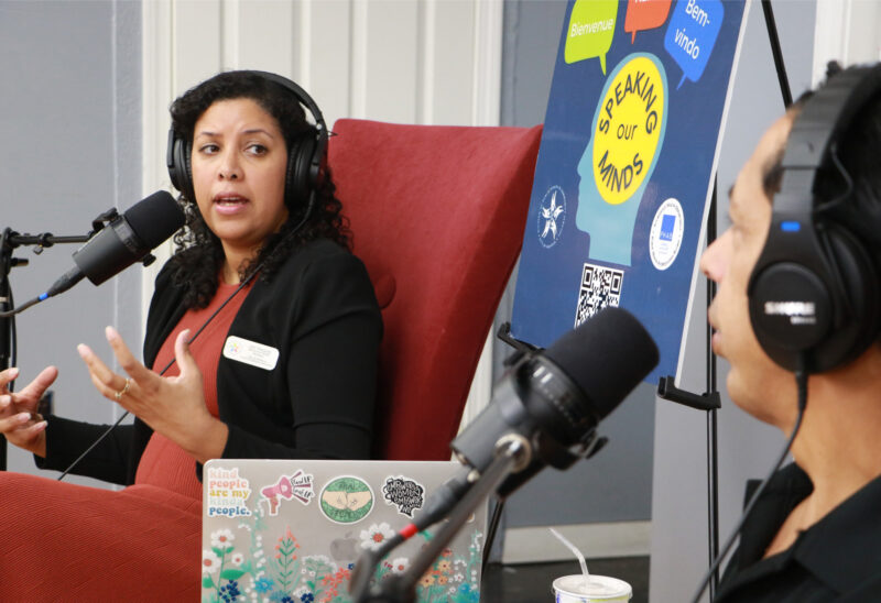 Lisa Vasquez of the Nashua Department of Public Health and Rafael Almonte, owner of La Fama 2 Barber Shop.